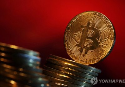 비트코인, 사상 첫 7만달러 웃돌아…신고점 경신 후 하락 조정