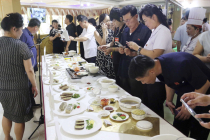 [포토 뷰] 북한의 개고기 요리 대회